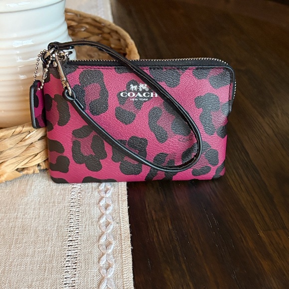 Coach Handbags - Coach Corner Zip Wristlet in Cranberry and Black Leopard Print